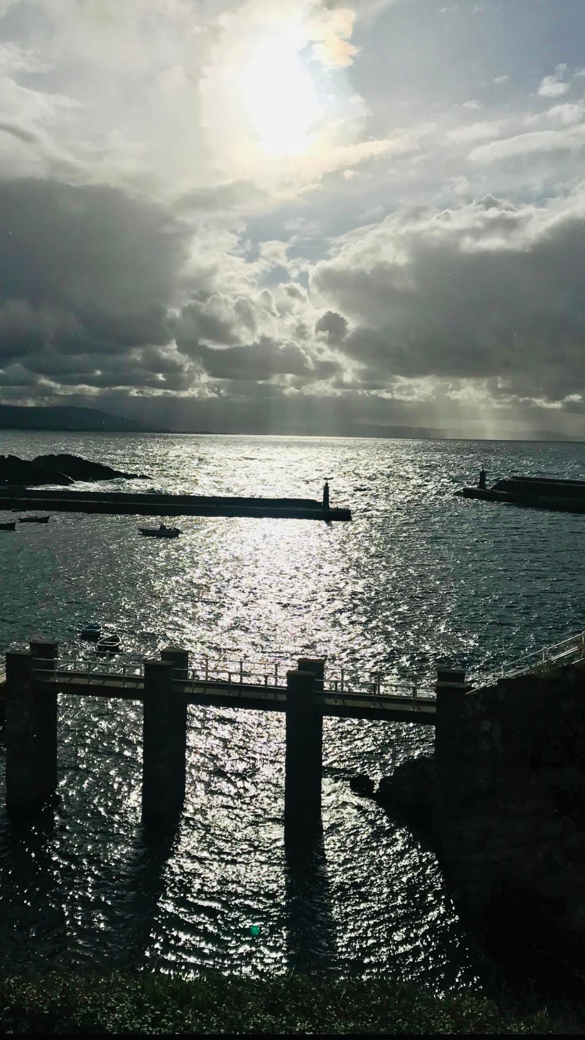 Atardecer sobre los faros de Tapia